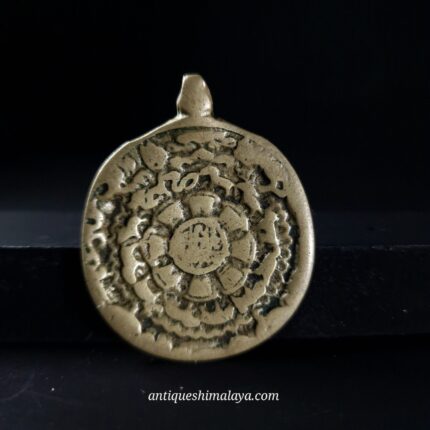 antique tibetan calendar thogchag amulet front view