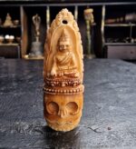 kapala buddha skull amulet leg bone carved chittipati detail aged surface