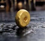 Hand-crafted 18c solid gold bead with a rich luster.