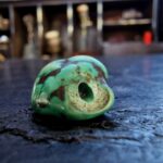 Hand-selected turquoise stone with a natural dark matrix.