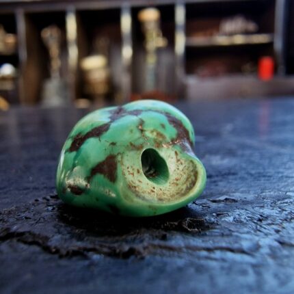 Hand-selected turquoise stone with a natural dark matrix.