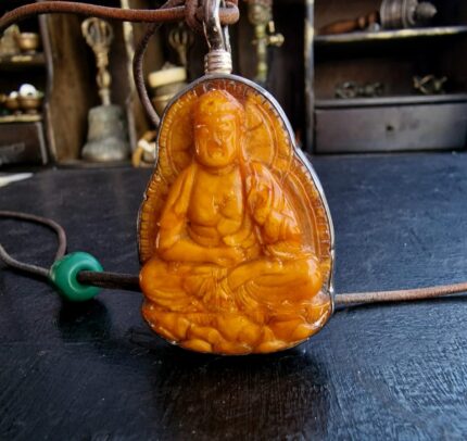 Hand-crafted Budha ritual amulet with an authentic aged patina.