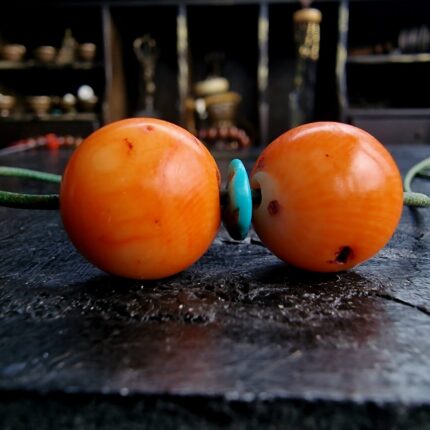 Hand-selected coral beads with a rich natural red hue.