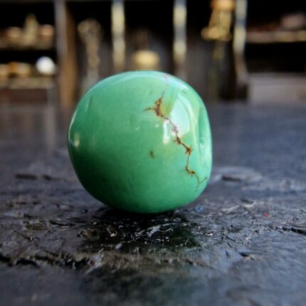 Hand-selected Tibetan turquoise with a natural dark matrix.