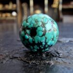 Hand-selected Tibetan turquoise with a natural dark matrix.