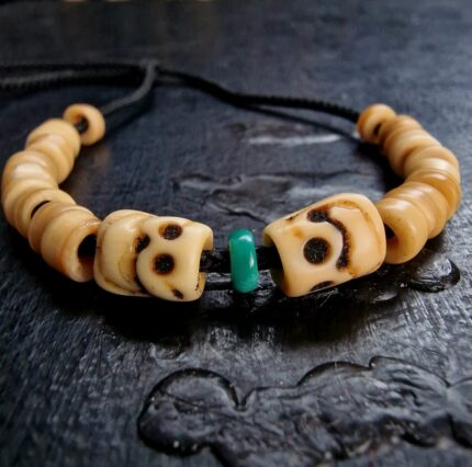 Hand-carved Ivo ritual bracelet with an authentic aged patina.