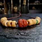 Hand-carved Ivo ritual bracelet with an authentic aged patina.