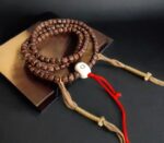 Hand-strung Rudraksha mala with natural multi-faced seeds.