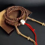 Hand-strung Rudraksha mala with natural multi-faced seeds.