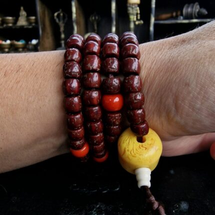 Hand-strung Rudraksha mala with natural multi-faced seeds.