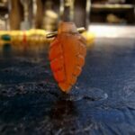 Ancient carnelian agate leaf amulet close-up