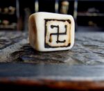Rare 19th century ivo dice with swastika symbols