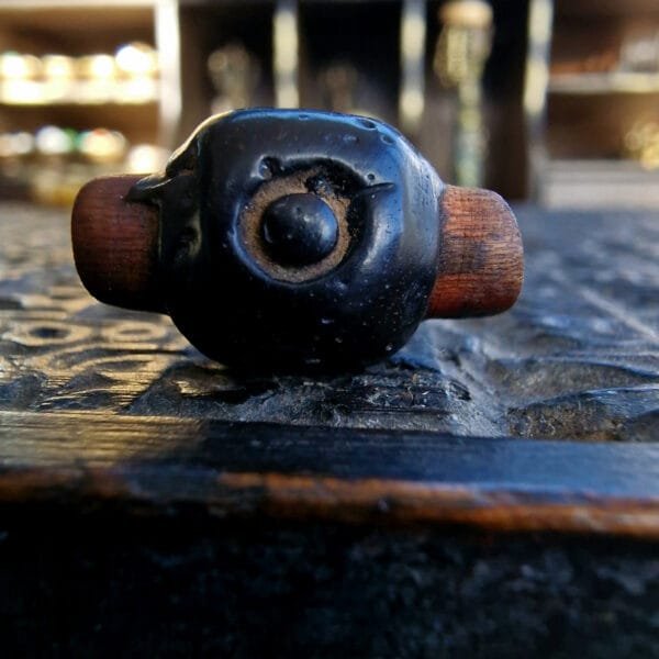 Medicine dzi bead showing patina