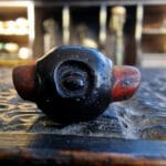 Hand-etched Tsa Dzi bead with authentic ritual cinnabar marks.