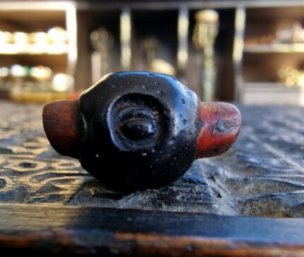 Hand-etched Tsa Dzi bead with authentic ritual cinnabar marks.