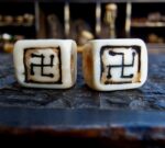 Close-up of patina on ivo dice from Tibet