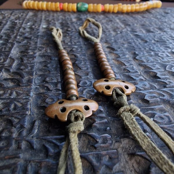 Tibetan copper mala counters close-up