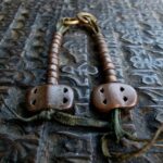 Early 20th century copper counters beads close-up