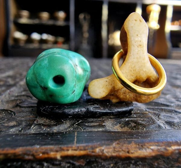 Tibetan turquoise and kapala skull bone amulet