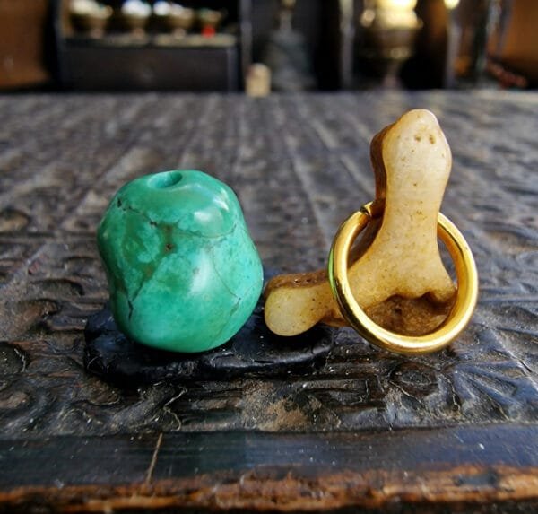 Ancient turquoise 300 years old with kapala bone amulet