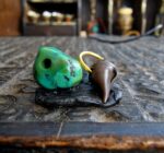 Tibetan turquoise thogchag amulet showing patina