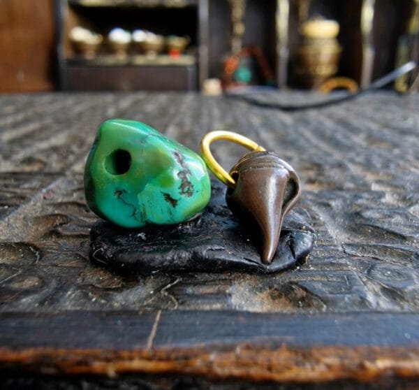 Tibetan turquoise thogchag amulet showing patina