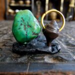 500-year-old turquoise amulet with black leather cord