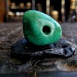 Tibetan turquoise skull bone amulet close-up