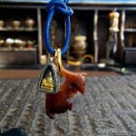 Tibetan kapala Buddha ghau amulet showing patina
