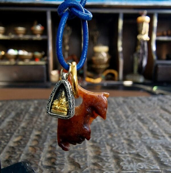 Tibetan kapala Buddha ghau amulet showing patina