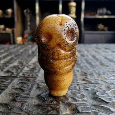 Tibetan kapala guru bead carved from lama skull bone