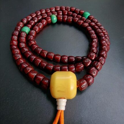 Hand-strung Rudraksha mala with natural multi-faced seeds.