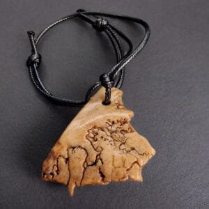 Kapala Amulet full view on string
