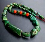 Tibetan turquoise bead strand with coral spacers