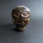 Tibetan kapala guru amulet carved from skull bone