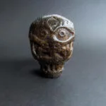 Tibetan kapala guru amulet carved from skull bone
