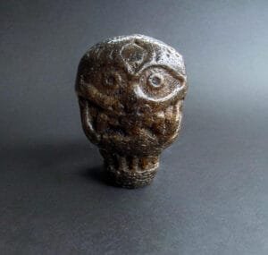 Tibetan kapala guru amulet carved from skull bone