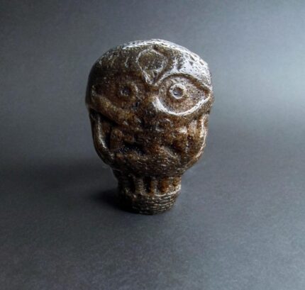 Hand-carved authentic Tibetan bone Kapala guru bead with a ritual patina.
