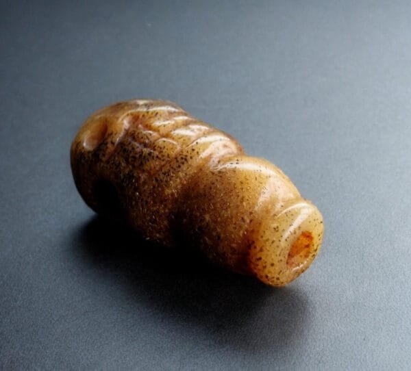 Antique kapala guru bead close-up