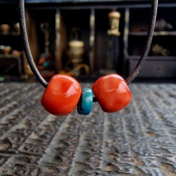 Antique Tibetan coral beads on string