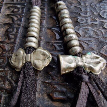 Vajra and bell mala counters with aged patina