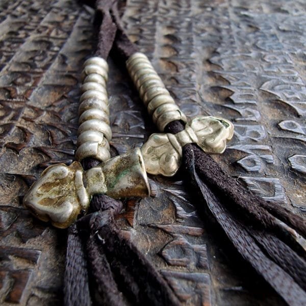 Rare Tibetan white copper ritual counters