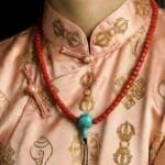 6mm red coral Tibetan prayer beads necklace with a natural turquoise guru bead focal.