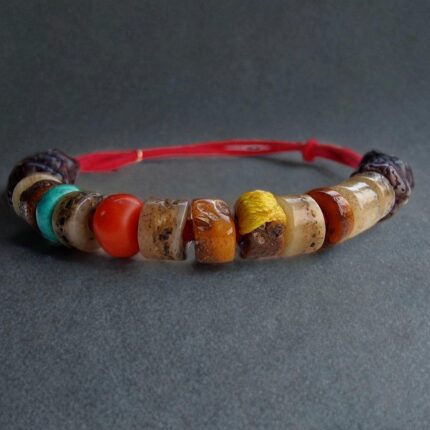 Hand-carved bone Kapala beads bracelet featuring a row of detailed ritual skulls.