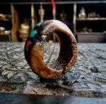 Hand-carved antique Tibetan kapala skull amulet