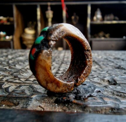 Hand-carved antique Tibetan kapala skull amulet