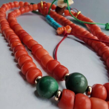 tibetan antique coral mala top view
