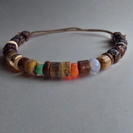 Hand-carved bone Kapala beads bracelet featuring small ritual skull beads with a smooth patina.