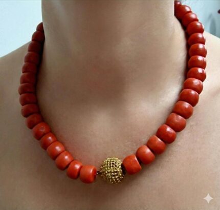 Hand-polished antique coral beads with authentic gold spacers and ritual patina.
