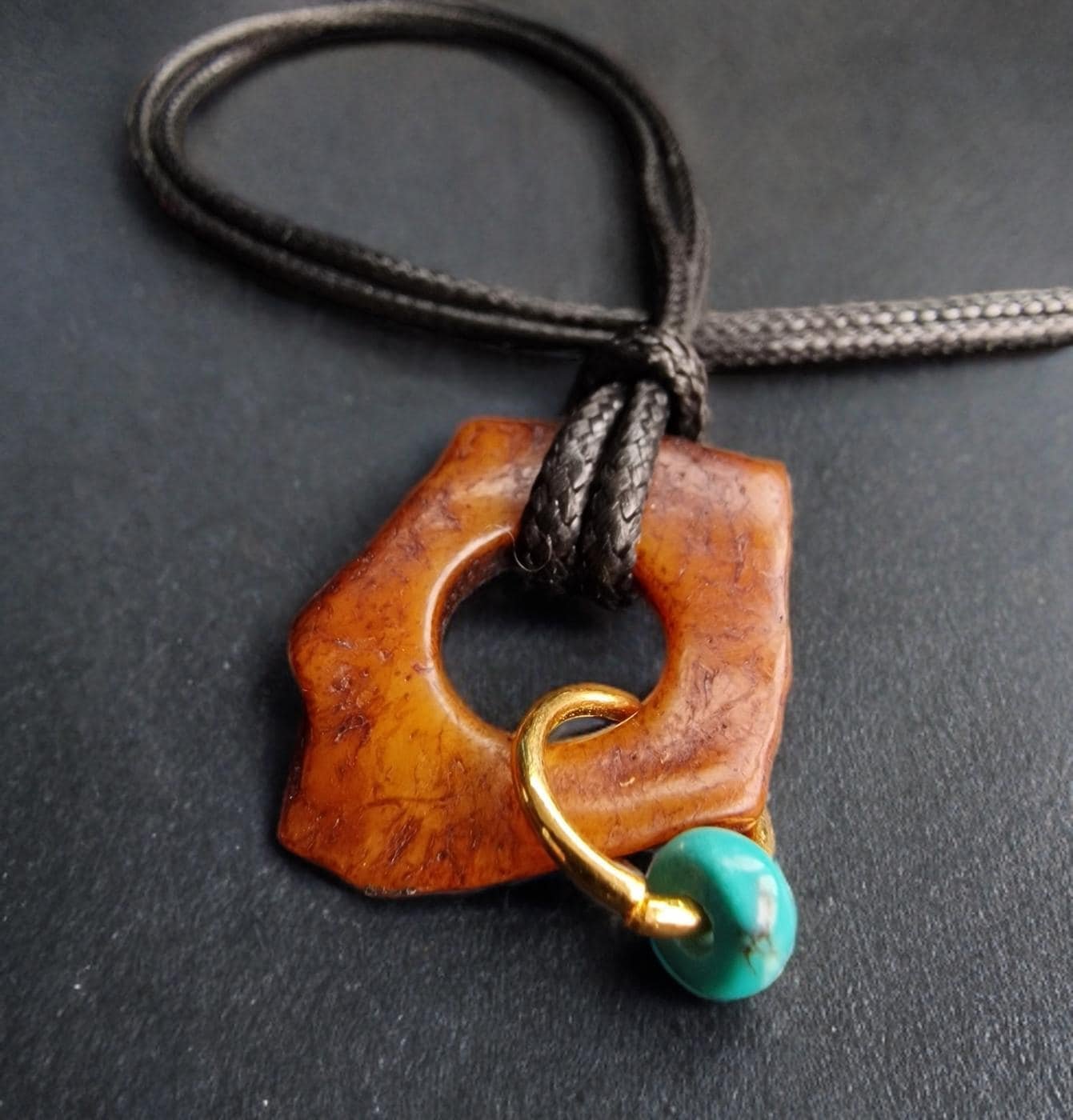 Hand-carved Kapala skull bone bead with an authentic ritual patina.